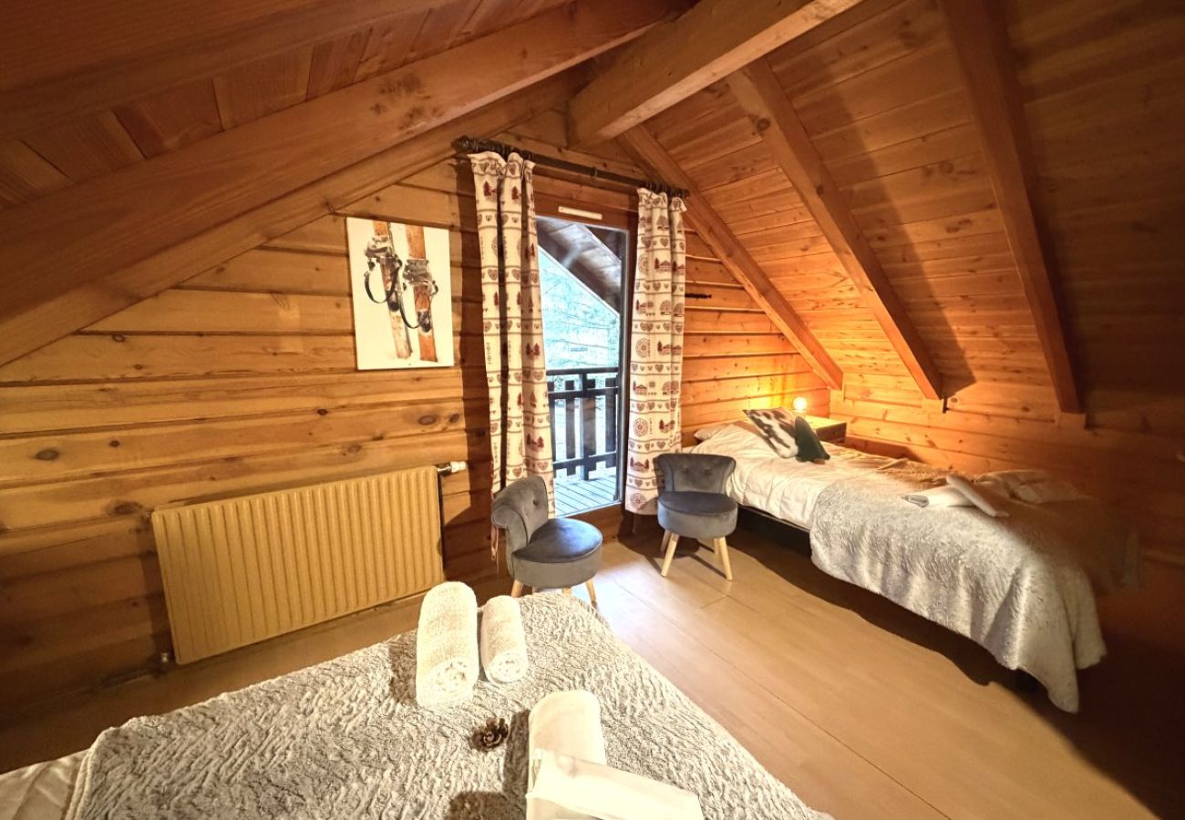 Chambre avec deux lits simples