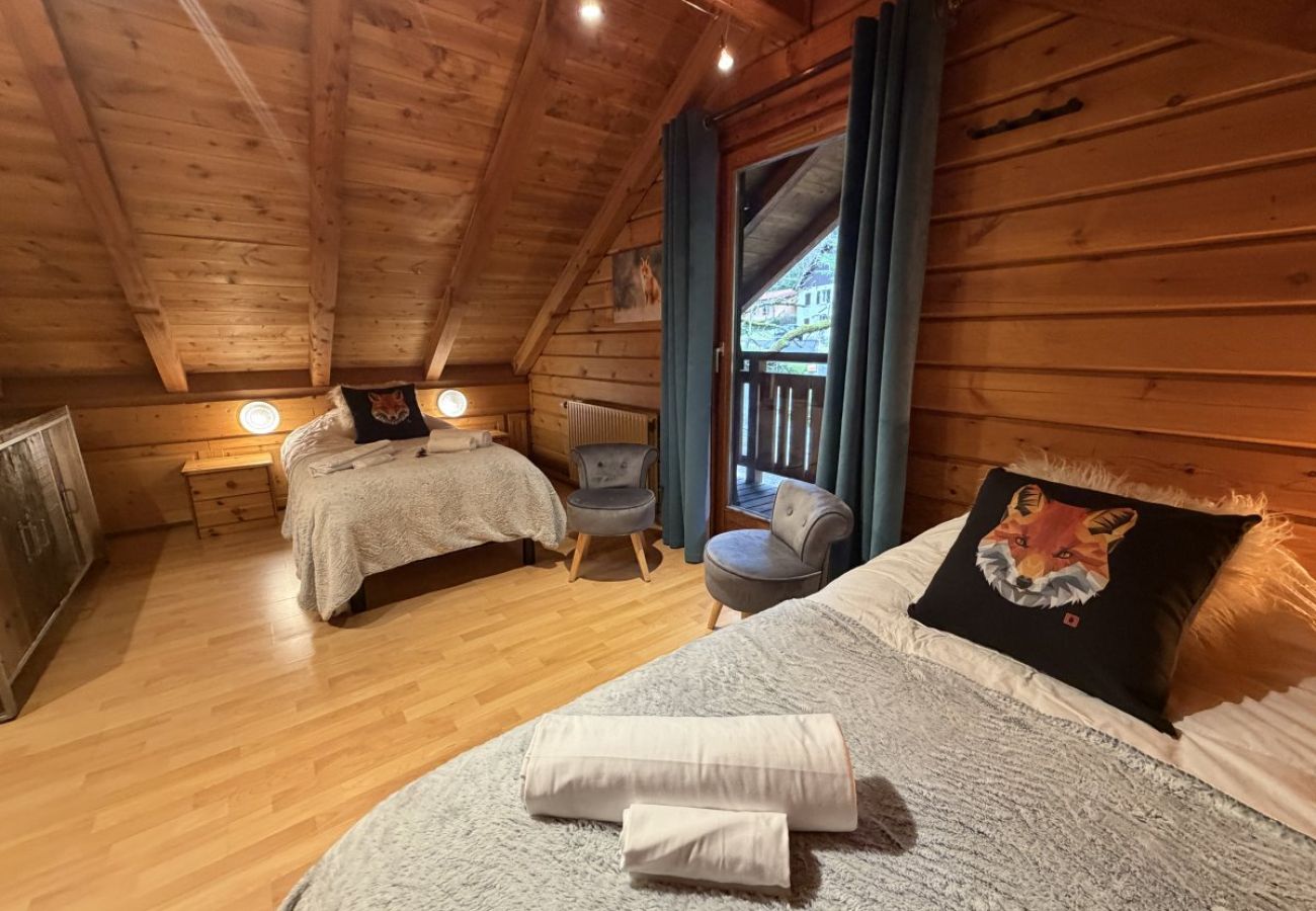 Chambre avec deux lits simples