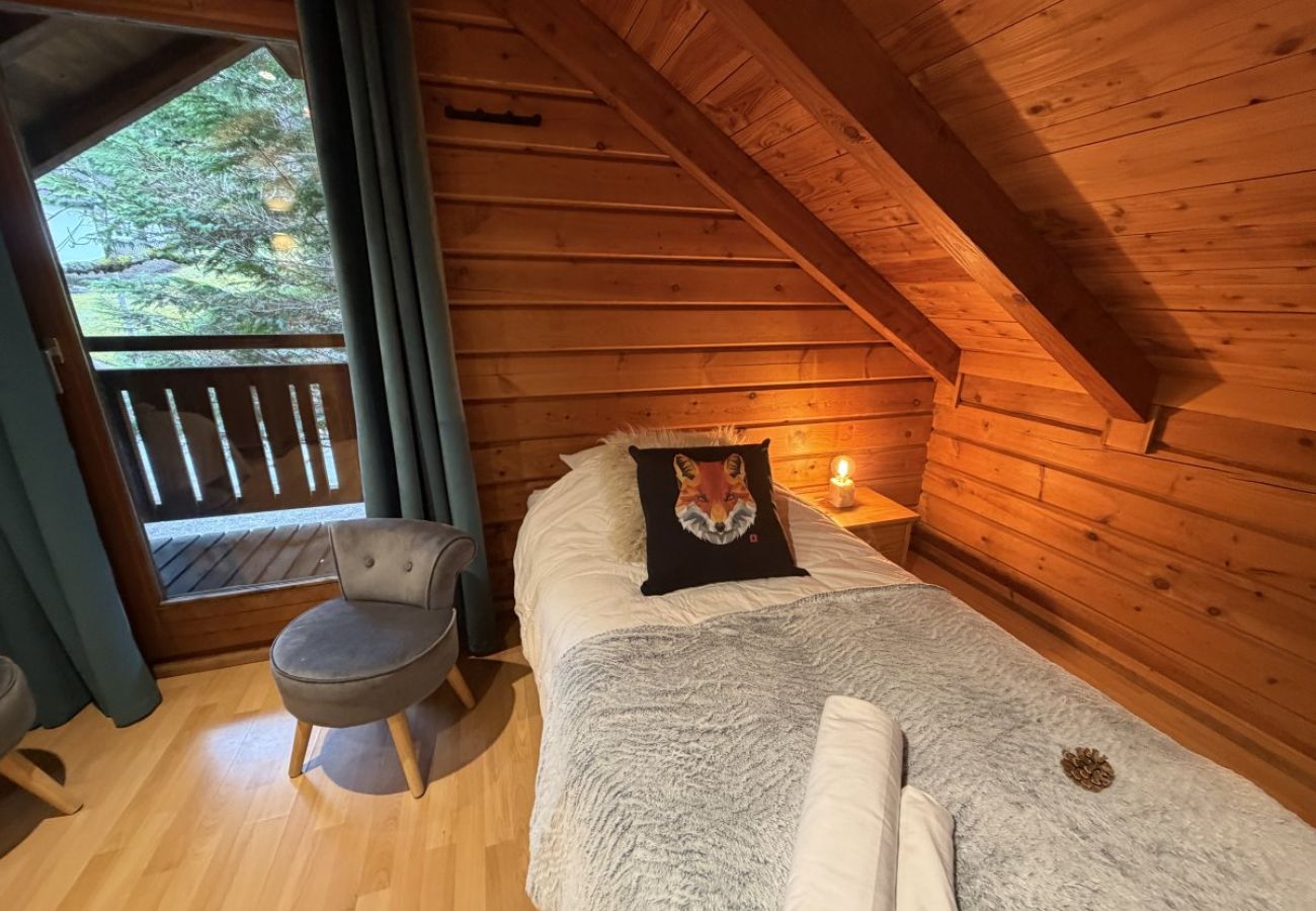 Chambre avec deux lits simples