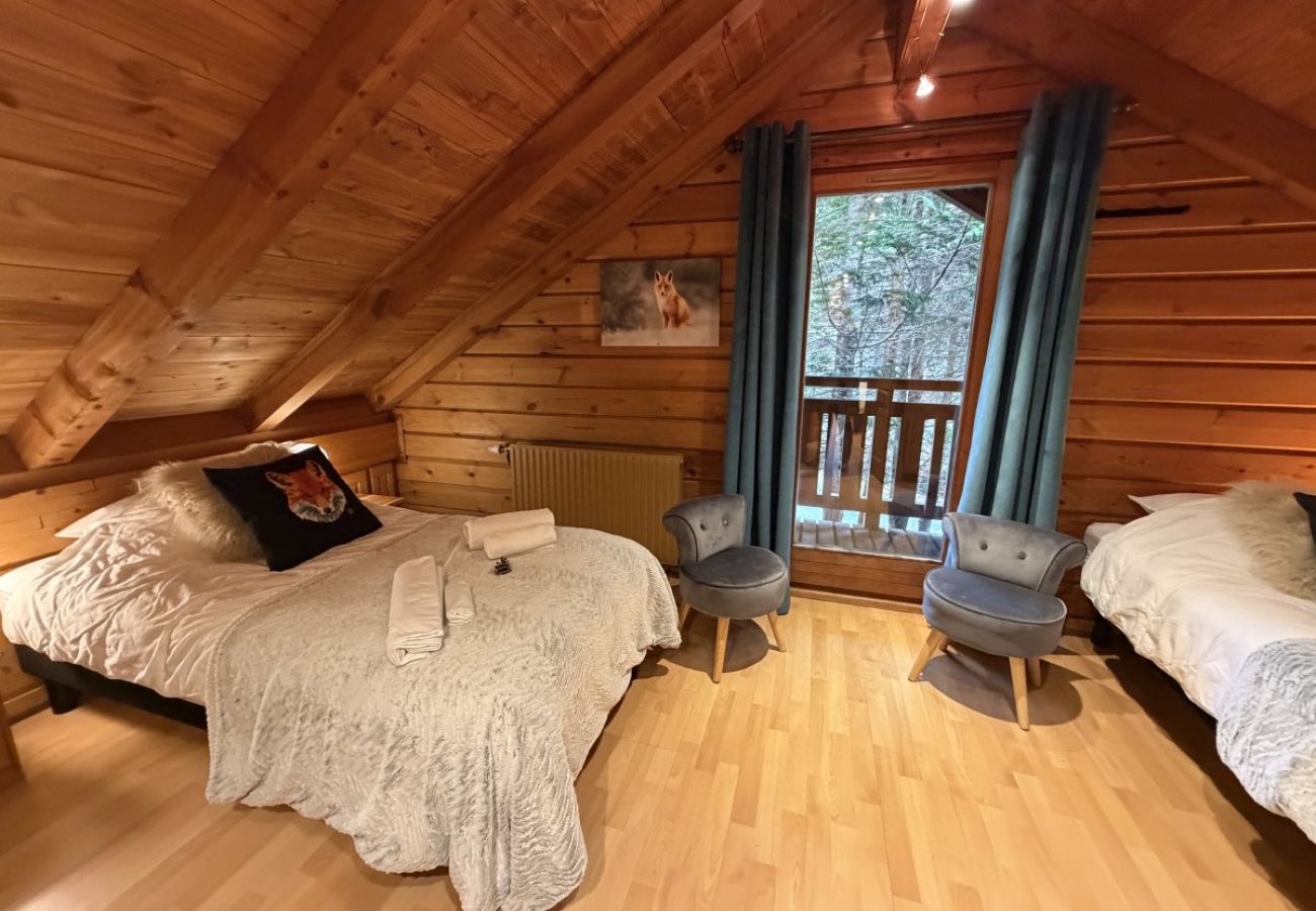 Chambre avec deux lits simples