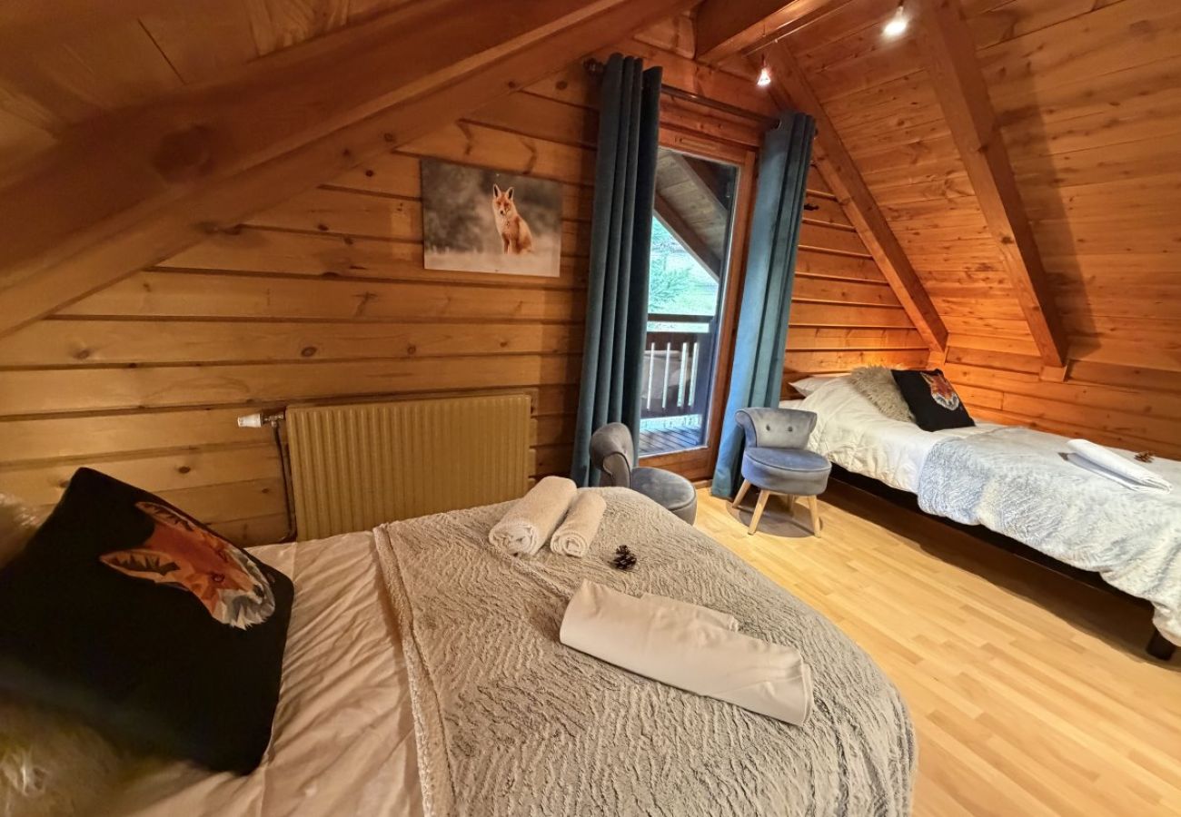 Chambre avec deux lits simples