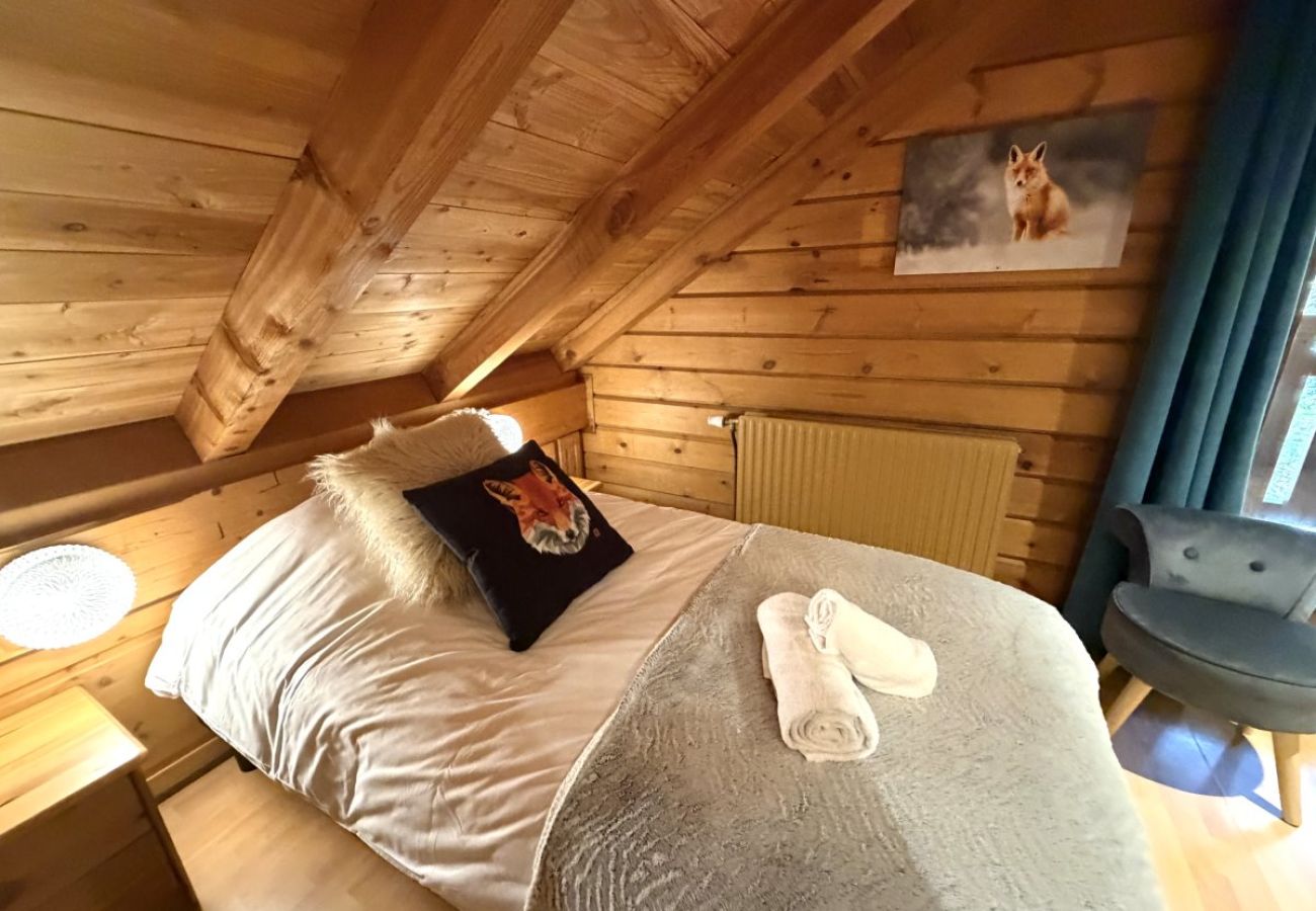 Chambre avec deux lits simples