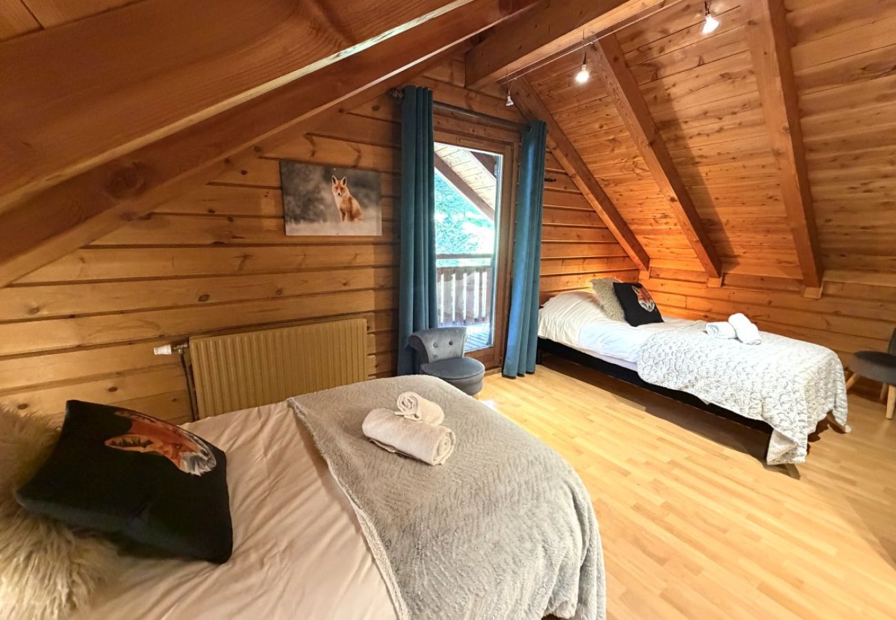 Chambre avec deux lits simples