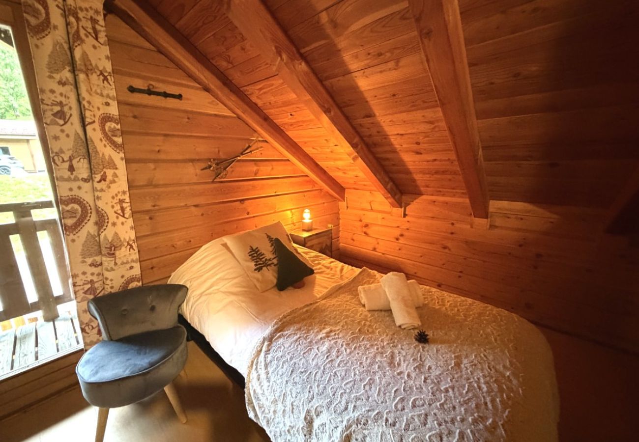 Chambre avec deux lits simples